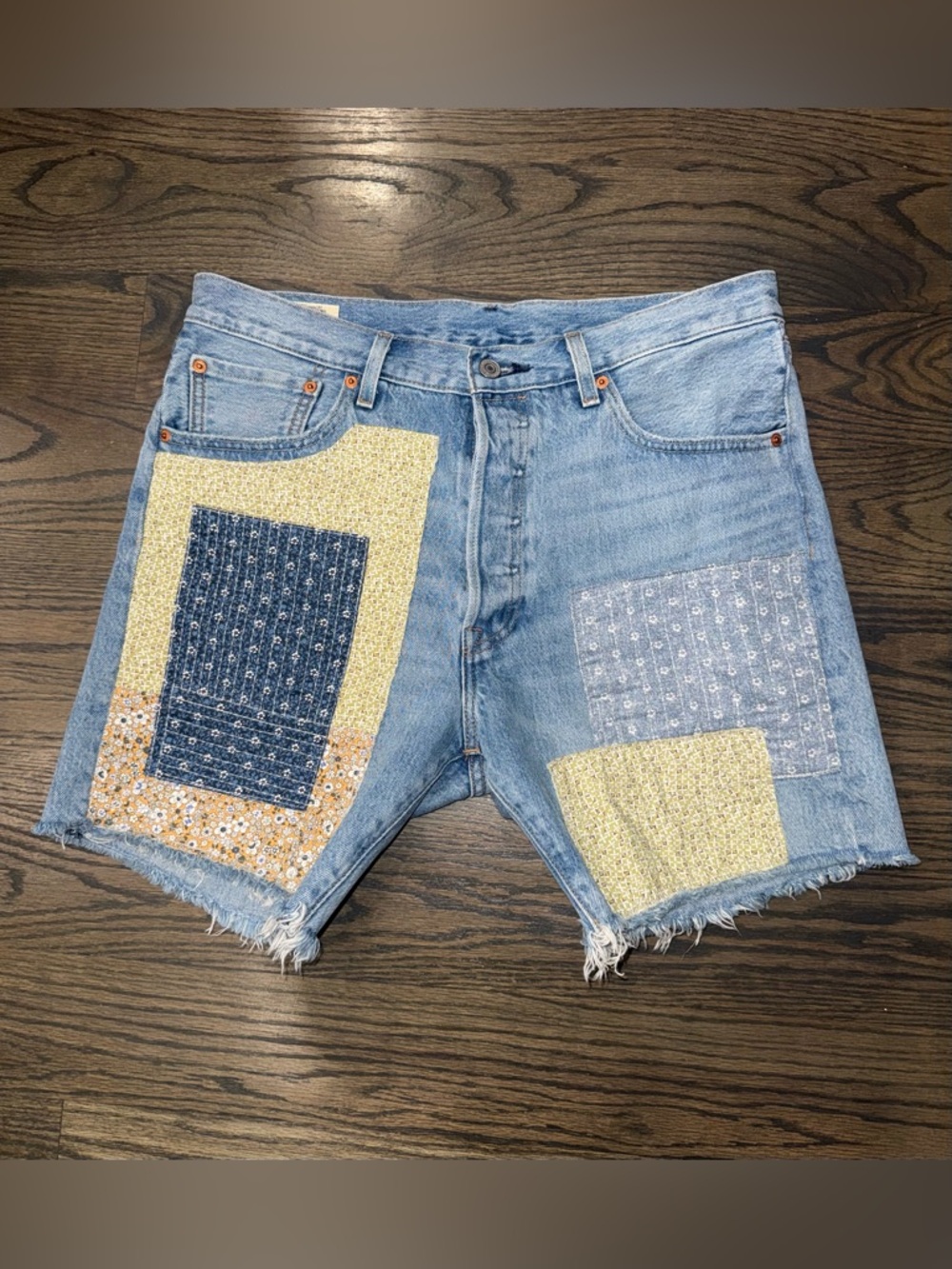 Levi's women's patchwork design 501 anniversary edition denim shorts size 33”